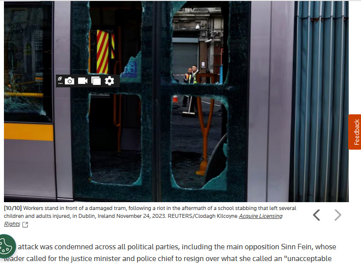 Workers In Fron tDamaged Tram After A Riot Dublin Ireland November 24, 2023 Workers In Fron tDamaged Tram After A Riot Dublin Ireland November 24, 2023